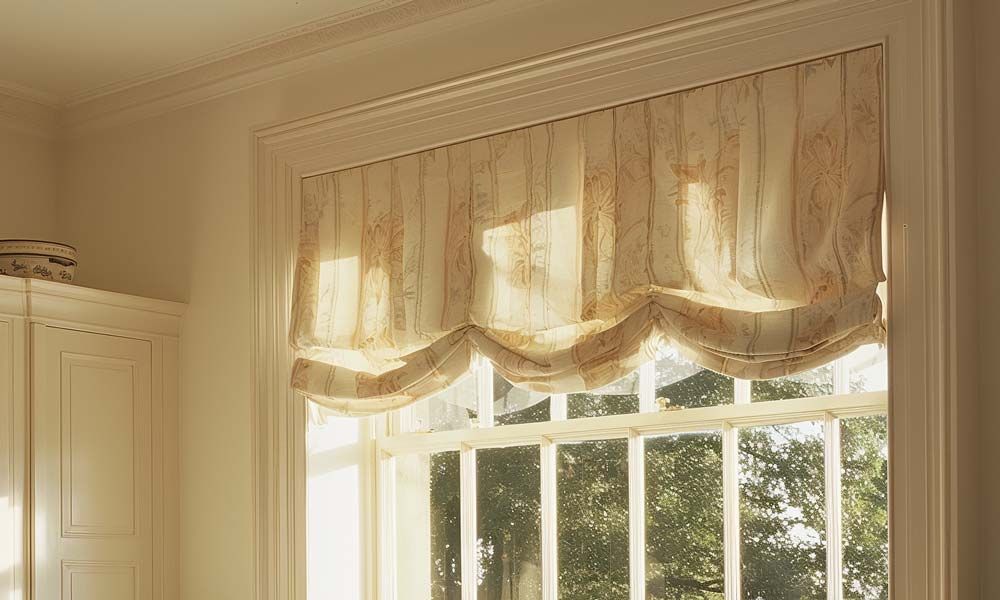 A soft valence above a window, adding a decorative touch to the room.