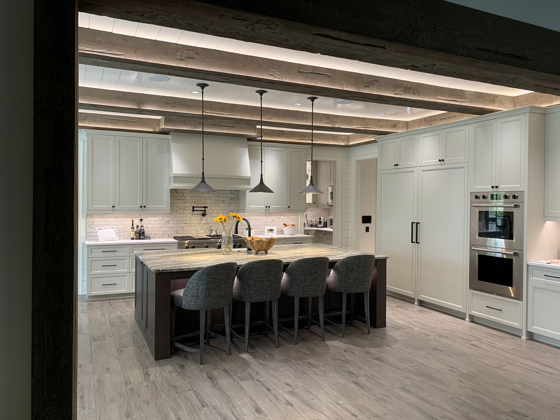 Spacious kitchen with soft ceiling lights.