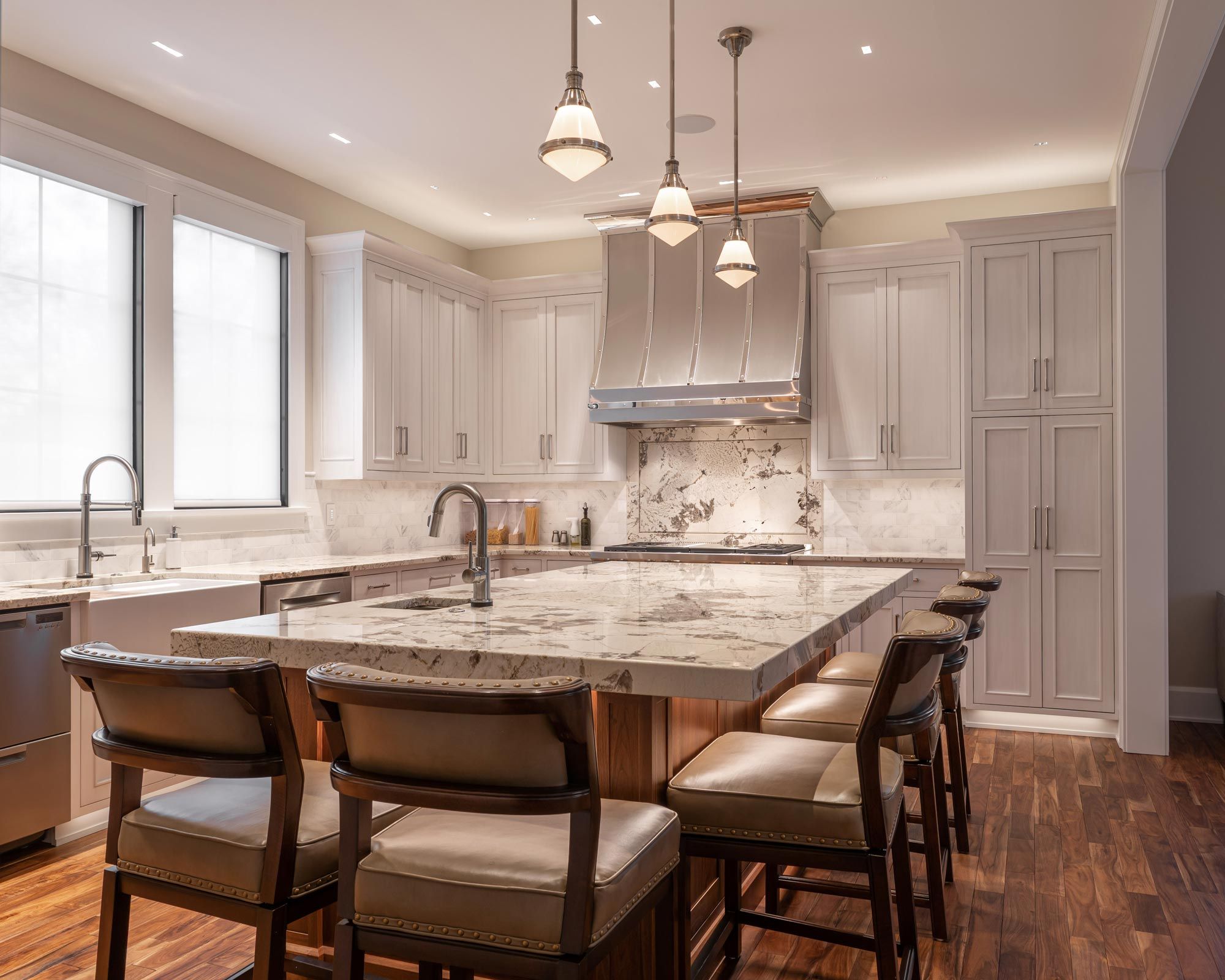 Bright kitchen with pendant lights over the island.